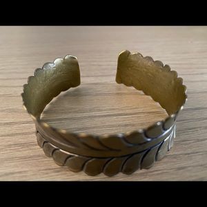 Adjustable brass bangle
